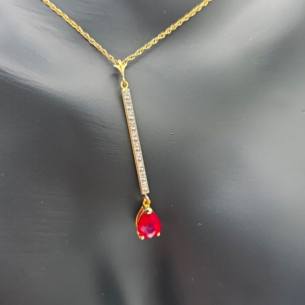 14K. SOLID GOLD NECKLACE WITH DIAMONDS & RUBY
